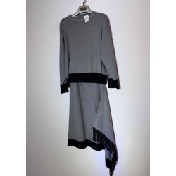 Conjunto punto de jersey y falda con detalle flecos