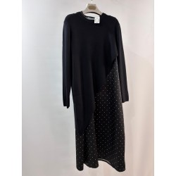 Vestido  de topos con jersey asimetrico