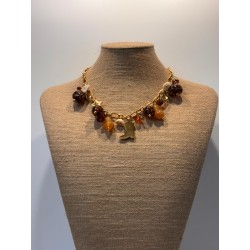 Collar de acero con piedras y detalles dorados