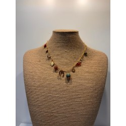 Collar de acero con herradura de la suerte y piedras.