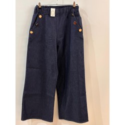 Pantalón vaquero acampanado botones dorados