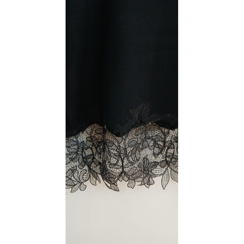 Conjunto punto jersey y pantalón con puntilla