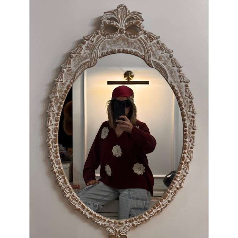 Modelo talla 38 y  color granate.