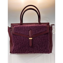 Bolso polipiel con borreguillo